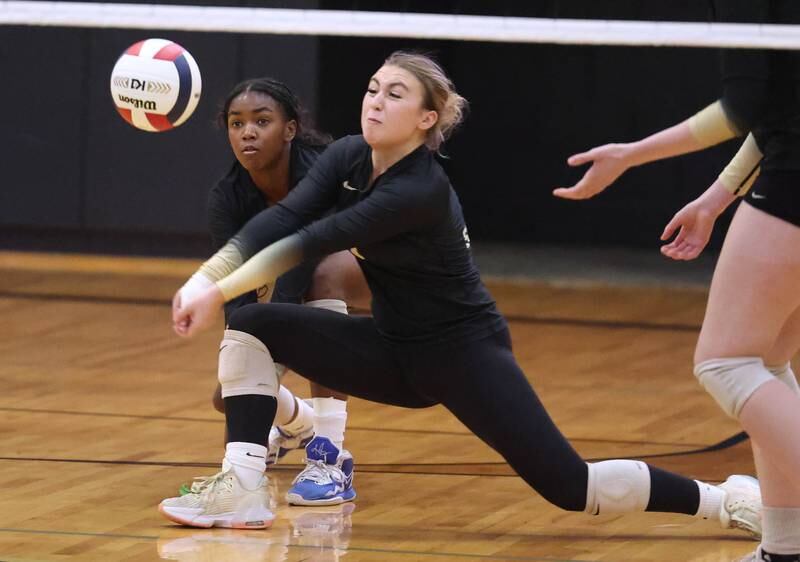 Sycamore's Kylie Walsh receives a Burlington Central serve in front of teammate Khiara  Thomas Tuesday, Oct. 29, 2024, during their Class 3A regional match at Sycamore High School.
