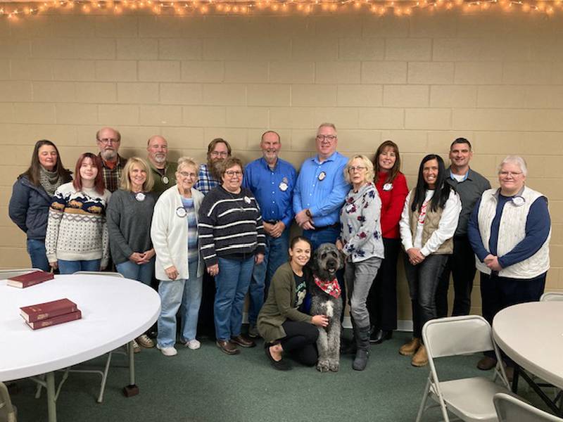 Members and guests at the recent Rock Falls Rotary meeting took a moment to pose with the newest “ex-officio member”, Twister. Twister is a therapy dog at CGH and is owned and trained by Molly Mammosser, who is kneeling with Twister in the center of the photo. Rock Falls Rotarians presented Mammosser and Twister with a check for $500 to offset expenses of a week of training on how to manage a therapy dog. Twister is located at the CGH Physical Therapy Building on North Locust Street in Sterling, where Mammosser works. Rotarians took up a collection to offset her expenses to bring Twister to the Sauk Valley community.