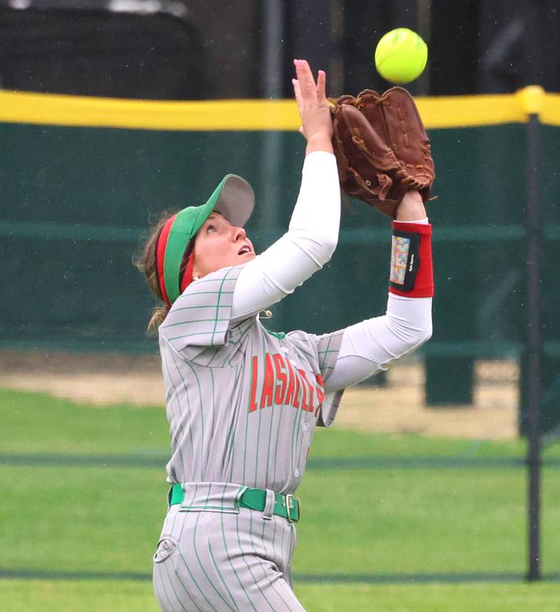 LaSalle-Peru's Karmen Piano catches a flyball Thursday, April 30, 2026, during their game at Sycamore High School.
