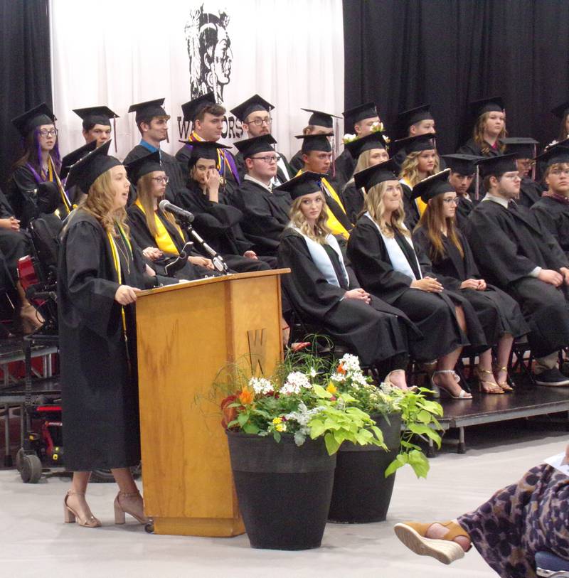 Graduating senior Mya Wulzen gives a speech Sunday, May 21, 2023, to her Woodland High School Class of 2023 peers during the graduation ceremony in the Warrior Dome gym.
