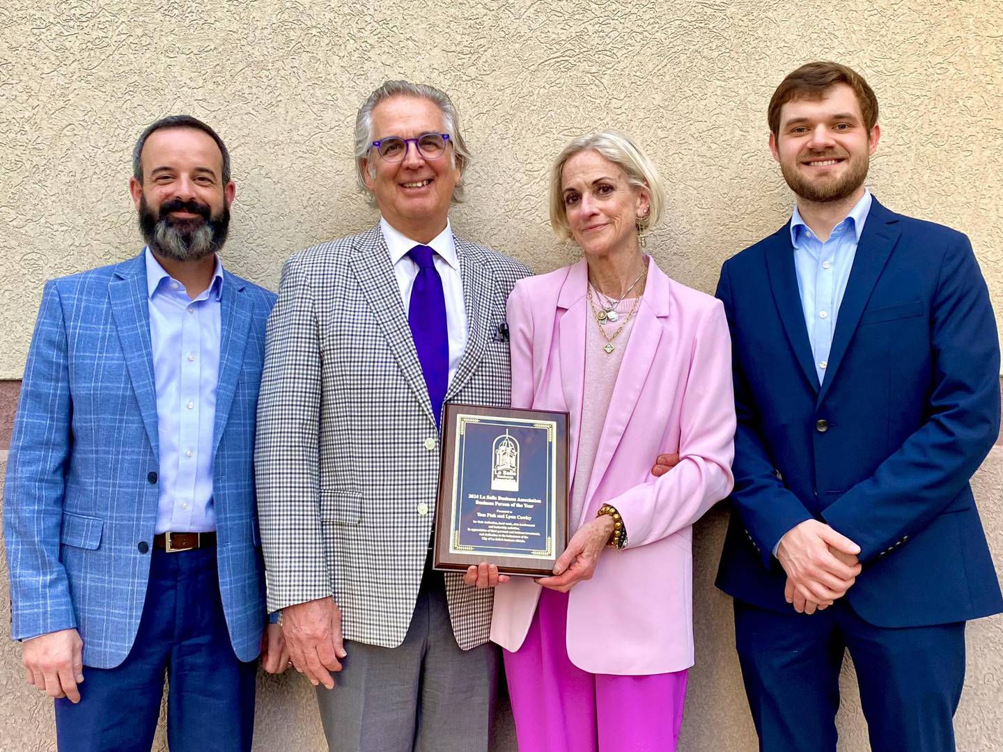 The 2024 Businesspersons of the Year was awarded to Tom Ptak and Lynn Cawley, owners of Studio 718 Hair Salon.