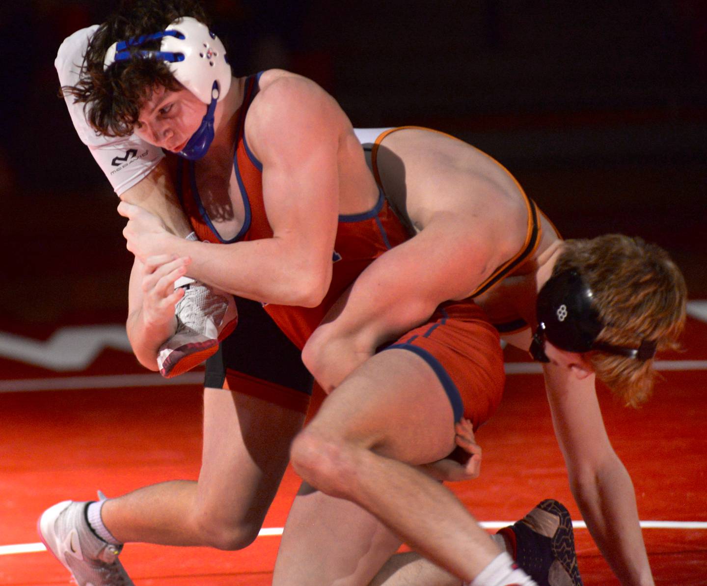 Morrison's Zach Milder (left) wrestles a Sandwich opponent on Friday, Jan. 26, 2024 at the Blackhawk Center in Oregon.