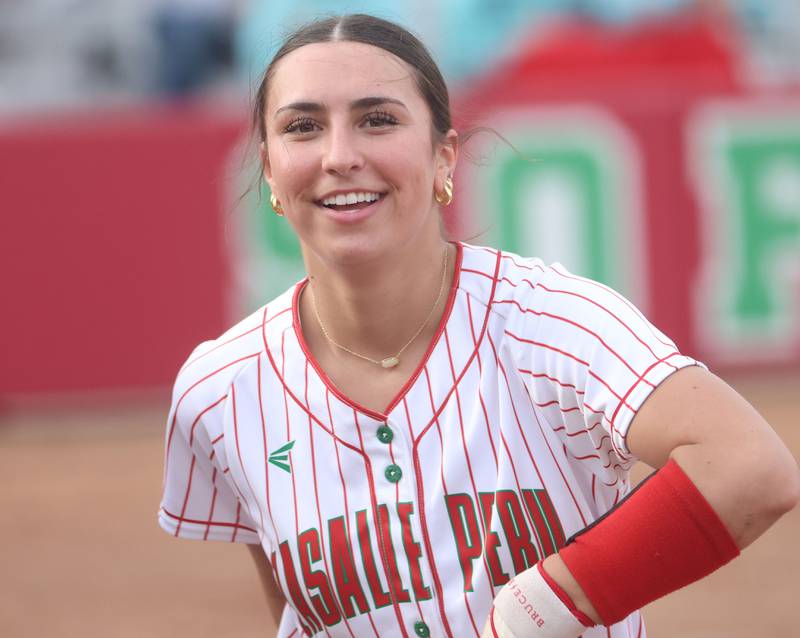 L-P's Anna Riva smiles after hitting a home-run on Friday, March 20, 2026 at the L-P Athletic Complex in La Salle.