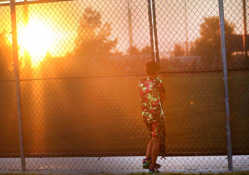 Javier England of Ottawa, watches the Prospect League Championship Series between the Illinois Valley Pistol Shrimp and Rex on Wednesday, Aug. 7, 2024 at Schweickert Stadium in Peru.