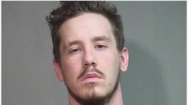 Woodstock man arrested on drug charges, accused of being armed with machine gun 
