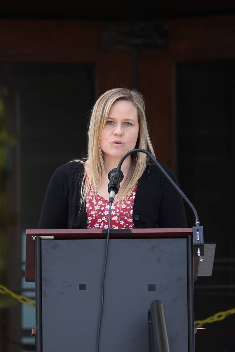 Ashley Appleton, Senior Veteran Service Officer at the Veterans Assistance Commission of Kankakee County, performs the roll call of departed comrades as wreaths are placed on Monday, May 26, 2025, during the Kankakee County Veterans' Council annual Memorial Day Ceremony at the Kankakee County Courthouse.