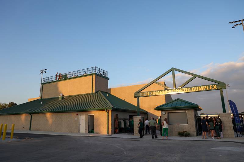 Attendees tour the new Bishop McNamara Rich Zinanni Athletic Complex during the ribbon-cutting ceremony on Thursday, Aug. 21, 2025.