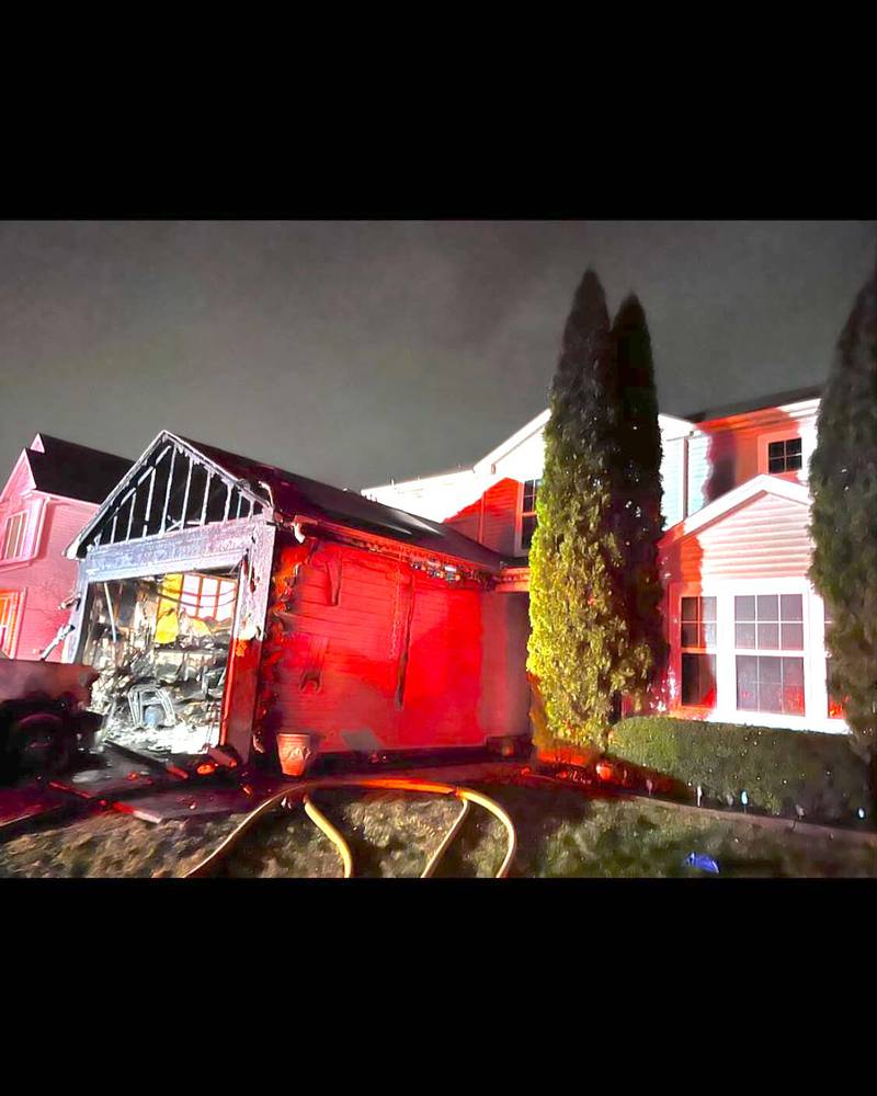 A home and garage in the 20400 block of Kingsbrook Drive in Crest Hill was damaged by fire on Monday, Feb. 3, 2025.