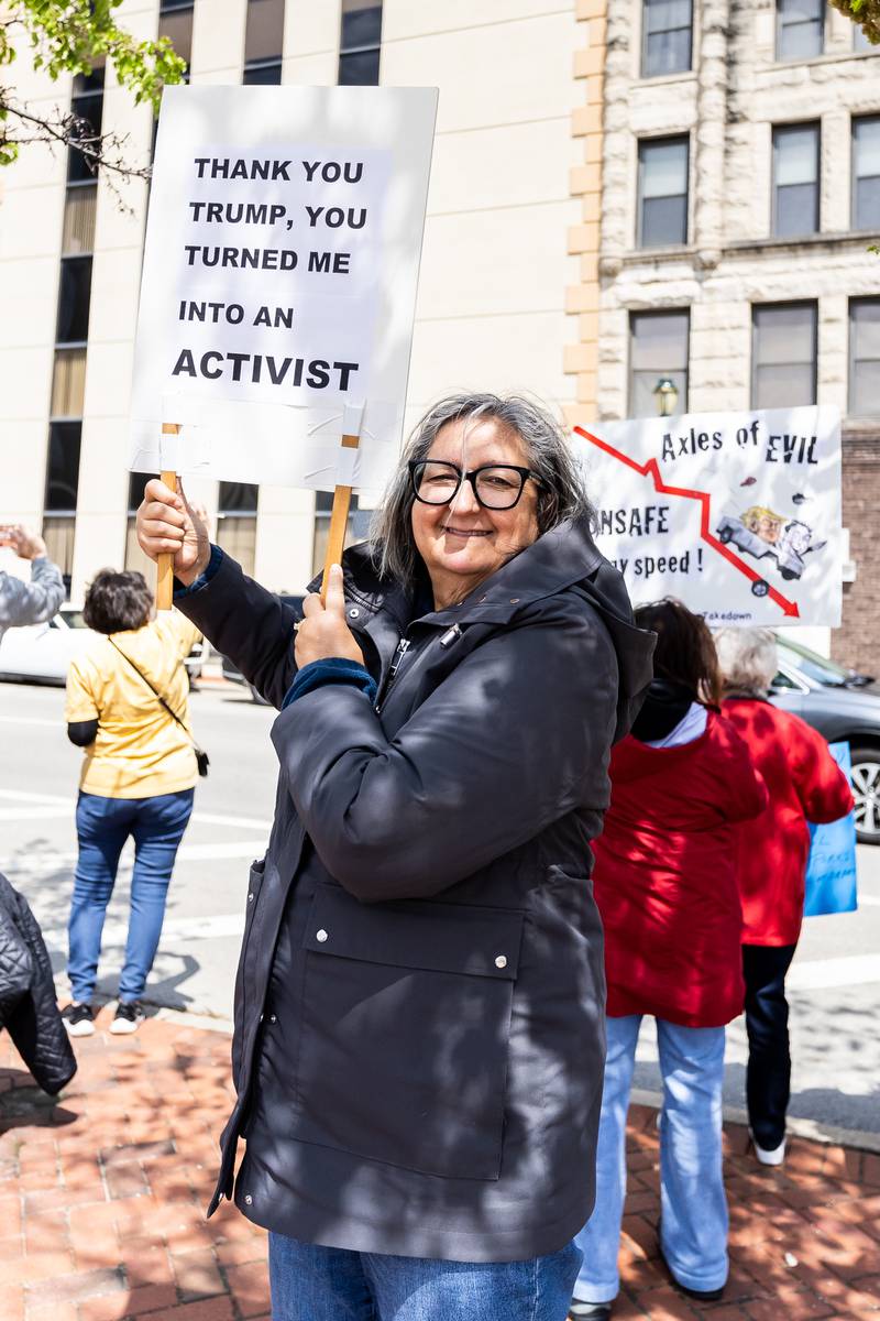 Mokena resident Marianne Dewey shares a message of gratitude for her newfound activism during the May Day Weekend Rally in Downtown Joliet on May 3, 2025.