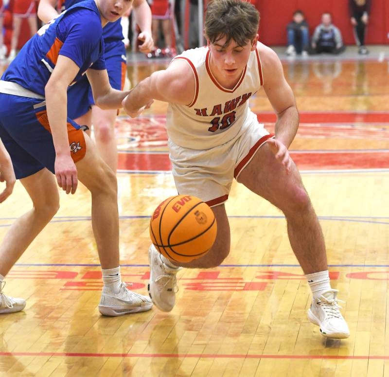 Oregon's Keaton Salsbury chases down a loose ball against Genoa-Kingston on Friday, Jan. 30, 2026 at the Blackhawk Center.