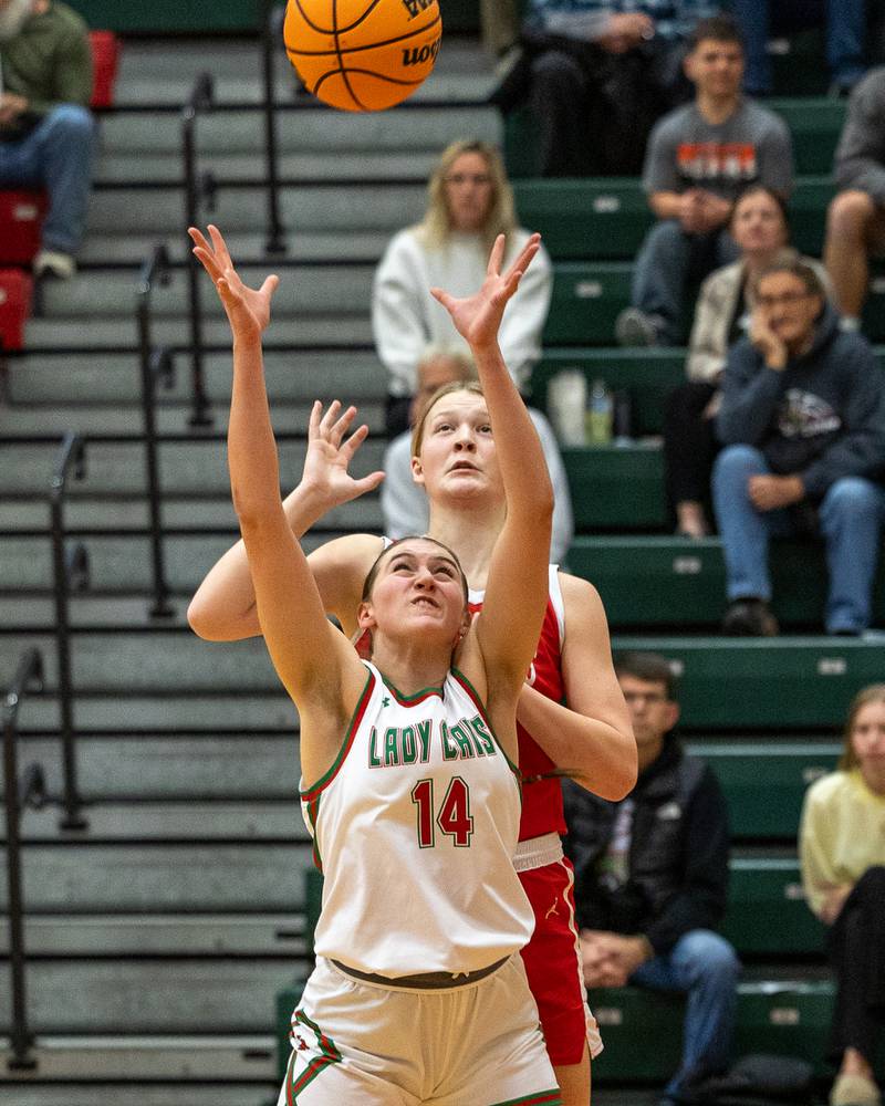 Drew Depenbrock (14) of LaSalle-Peru reaches for rebound on Wednesday, December 17, 2025 at Sellet Gymnasium in LaSalle.