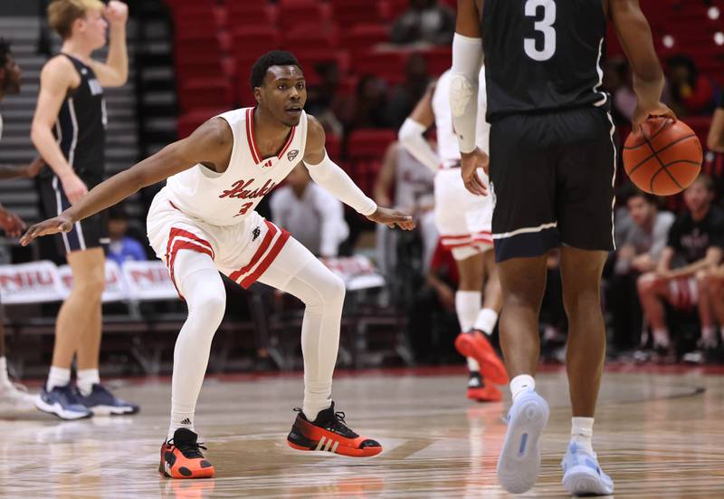 Northern Illinois' Joe Munden Jr. defends Monmouth's Madison Durr during their game Tuesday, Nov. 12, 2024, in the Convocation Center at NIU in DeKalb.