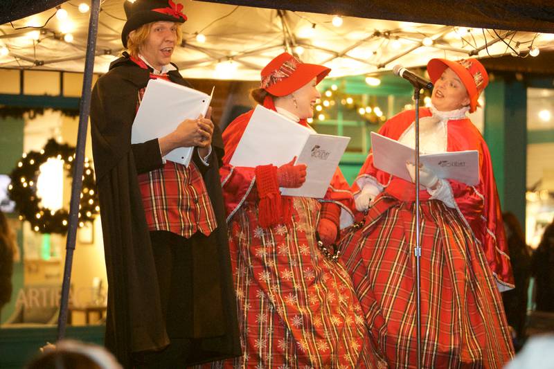 Carolers sing at the Geneva Christmas Walk on Friday, Dec.1 2023 in Geneva.