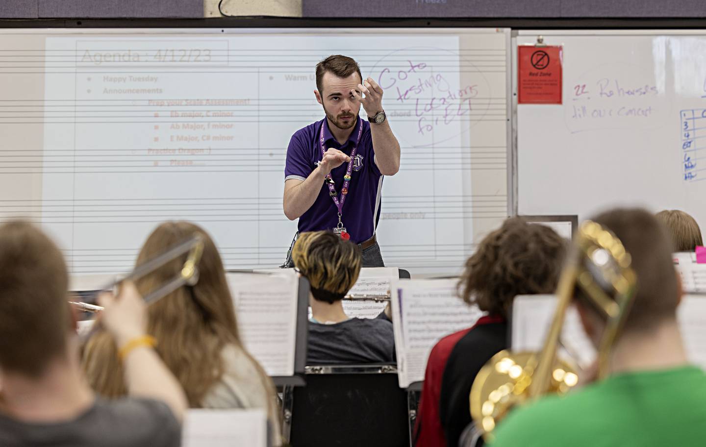 Dixon High School band director Riley Carter conducts his band Tuesday, April 11, 2023. Carter and company are practicing for the upcoming music contests.