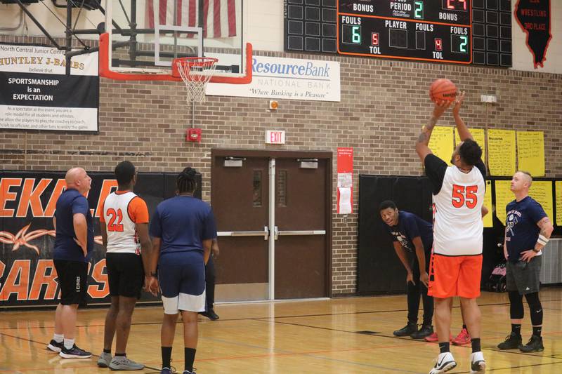 Luke Davis shoots and scores at the charity stripe Dec. 4, 2023 during the Guns and Hoses Basketball Game put on at Huntley Middle School in DeKalb.