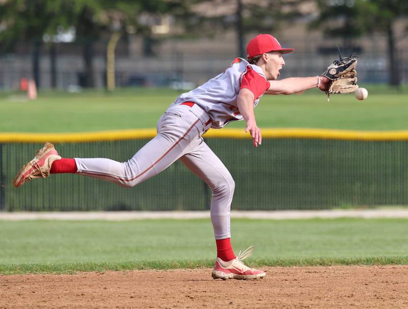 LaSalle-Peru's Grey Ernat can’t quite reach the ball up the middle Tuesday, May 12, 2026, during their game at Kaneland High School in Maple Park.