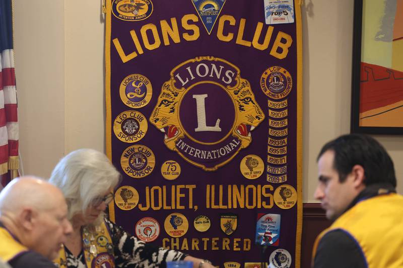 A Lions club banner hangs in a private dining area of the Silver Spoon restaurant for the Joliet chapter's meeting  on Thursday, Sept. 22, 2022, in Joliet. The Joliet Noon Lions Club, a community outreach organization, celebrated their 101st anniversary this year.