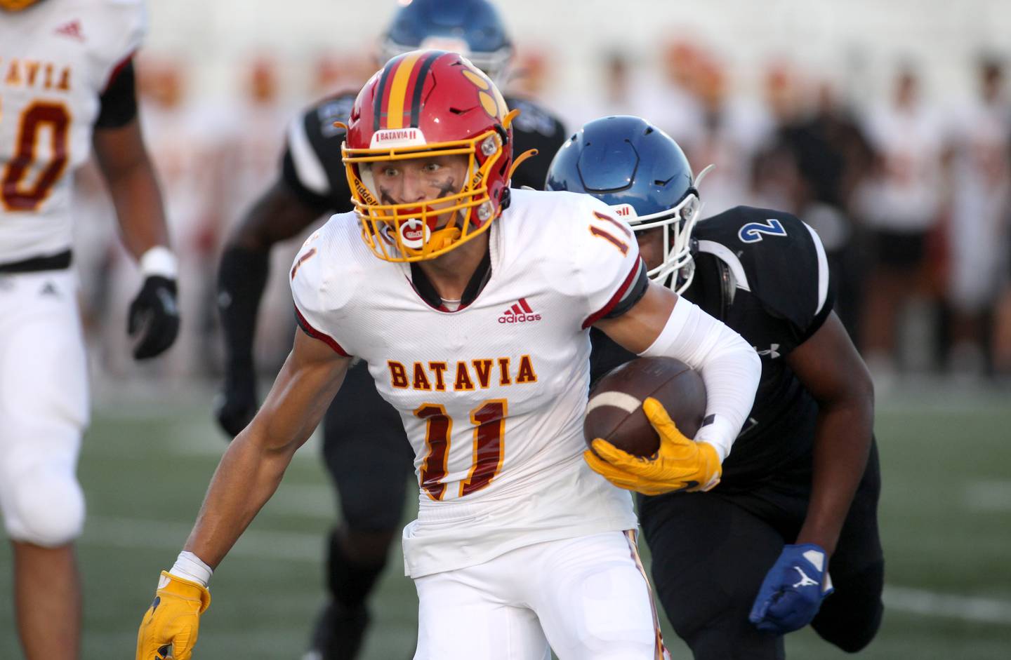 Batavia’s Drew Gerke runs the ball during a game against Phillips at Gately Stadium in Chicago on Saturday, Aug. 27, 2022.