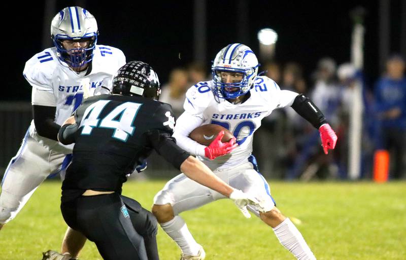 Woodstock’s Logan Wisner runs the ball in varsity football at Woodstock North High School on Friday, October 24, 2025.