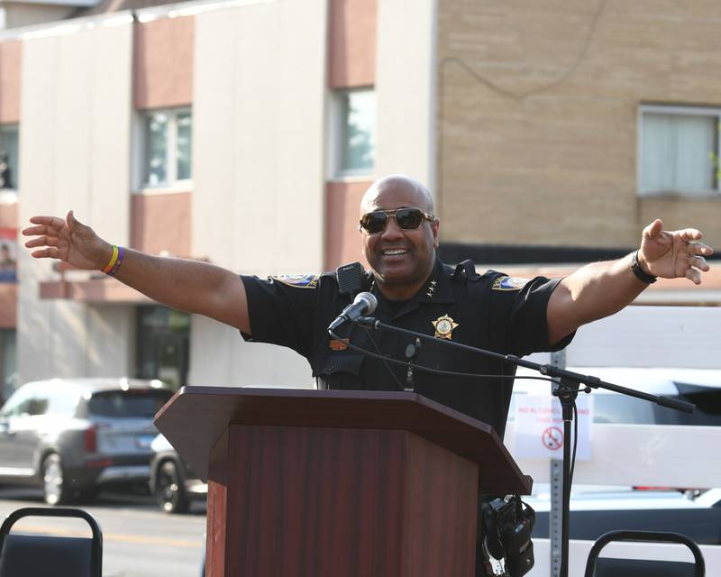DeKalb Police Chief David Byrd greets the crowd and gets them pumped up to celebrate DeKalb Pride Fest outside the Egyptian Theater, 135 N. Second St. in downtown DeKalb on Thursday, June 22, 2023.