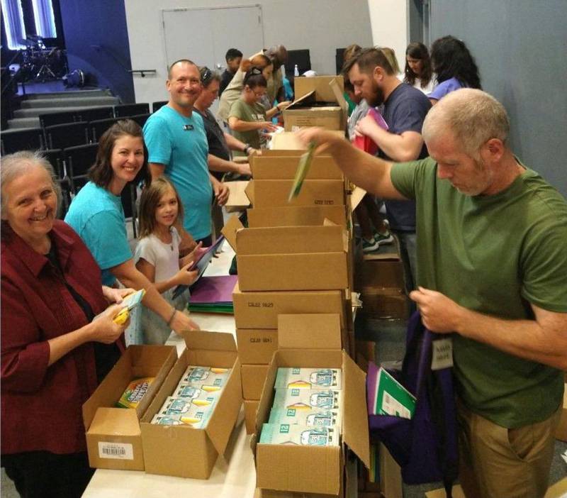 Church members at The Table in Joliet held a packing party on Sunday and filled 408 backpacks with school supplies. Volunteers from the church will give them away, up to two backpacks for family, at Kidz Fest on Saturday in downtown Joliet’s City Center.