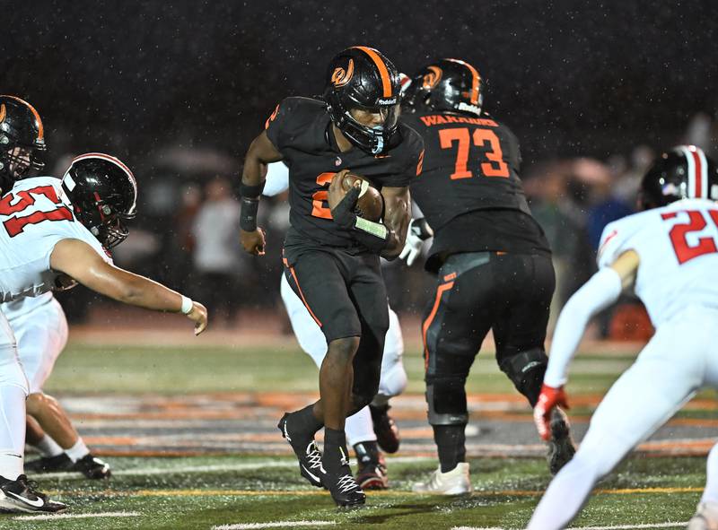Lincoln-Way West's Jahan Abubakar (2) rushes the ball during the conference game against Lincoln-Way Central on Friday, SEP. 19, 2025, at New Lenox.