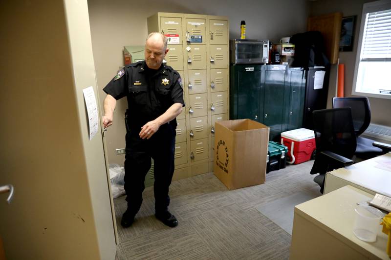 Elburn Police Deputy Chief Erich Schlachta shows the area that holds evidence, armory and some storage are kept in the cramped police department space. The department’s referendum for a new station was voted down in the April 4 Consolidated Election.