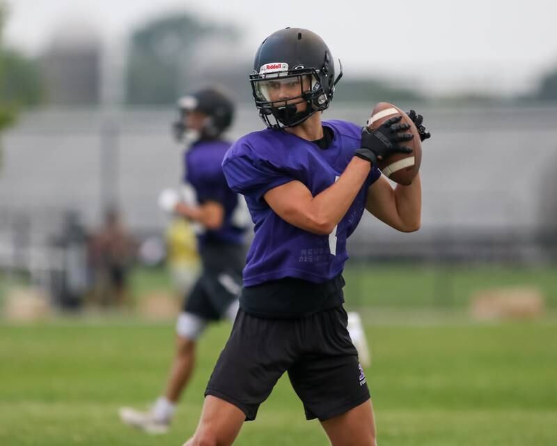 Plano's line hits the sled at Plano High School football practice.  August 9, 2023.