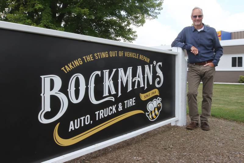Jon Bockman, owner of Bockman’s Auto, Truck & Tire, Friday, Aug. 2, 2024, in front of his DeKalb location on Industrial Drive.