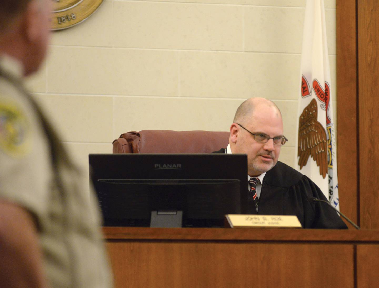 Judge John "Ben" Roe renders his decision on Monday, April 7, 2025, to deny pretrial release for Jonathon Gounaris, at the Ogle County Judicial Center in Oregon. Gounaris is charged with shooting three police officers during a June 2024 incident at his home in rural Dixon. He is being held at the Winnebago County Jail as his attempted murder case proceeds through the court system.