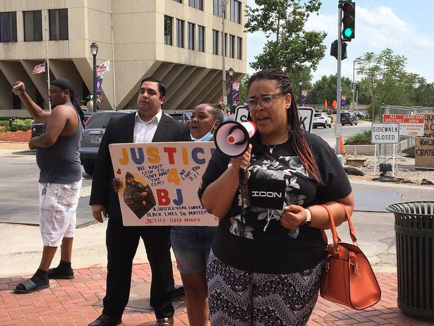 Protesters hold rally against Will County State's Attorney James Glasgow in response to the death of Eric Lurry on Monday, Aug. 10, 2020, in downtown Joliet.