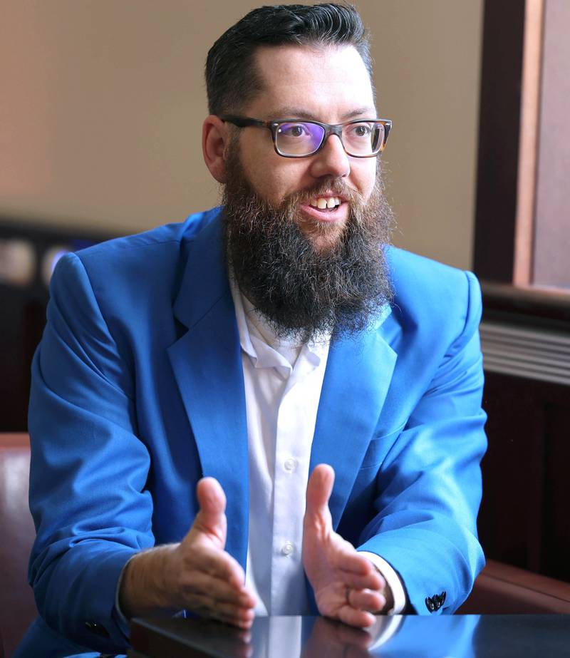 Devon Buse, a U.S. Army veteran, Northern Illinois University graduate and owner of Rapid Biz Solutions from Sycamore, talks Tuesday, Sept 12, 2023, in the Holmes Student Center at NIU, about his time in the Army and how it helped him prepare for being a business owner.