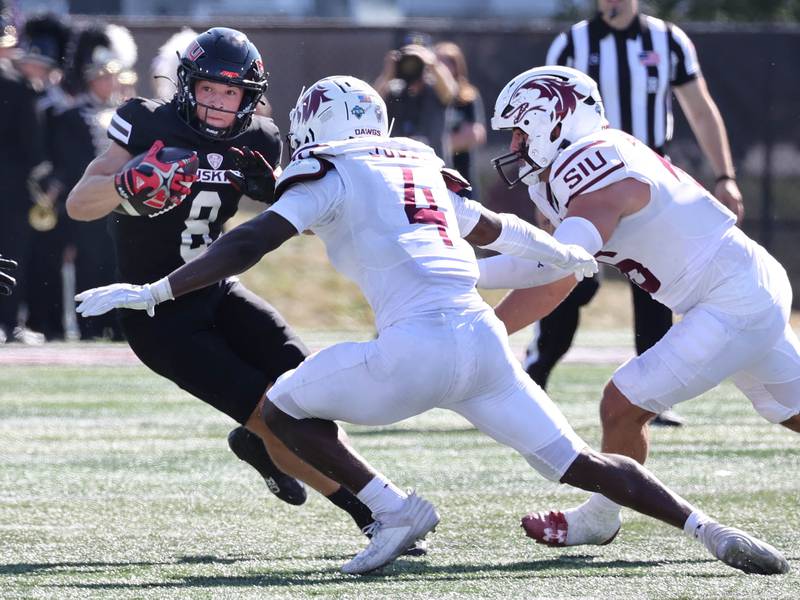 Northern Illinois' Kacper Rutkiewicz puts a move on Southern Illinois' PJ Jules during their game Saturday, Sept. 9, 2023, in Huskie Stadium at NIU in DeKalb.