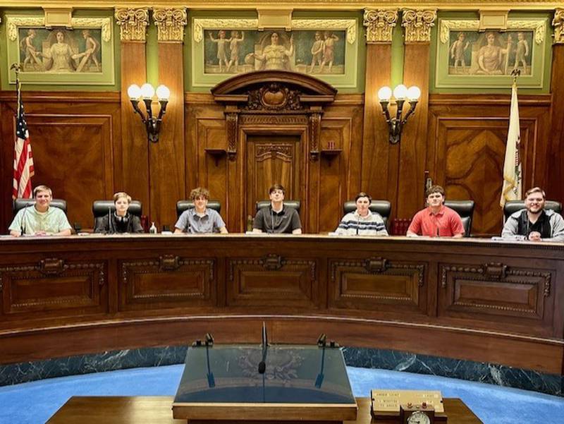 Seven students from La Salle-Peru Township High School competed in a March 16-17 mock trial in Springfield. Jakob Terzick (from left), Alex Crooks, Henry Pinter, Adam Lane, Ryne Bubela, Cameron Olivero and Brock Terzick were invited to sit at the Illinois Supreme Court bench at the invitation of Justice David Overstreet.