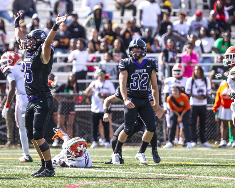 Downers Grove North's Baker Glomb (32) looks at his last second walk off field goal to defeat Morgan Park Saturday, Aug 30, 2025  in Chicago.