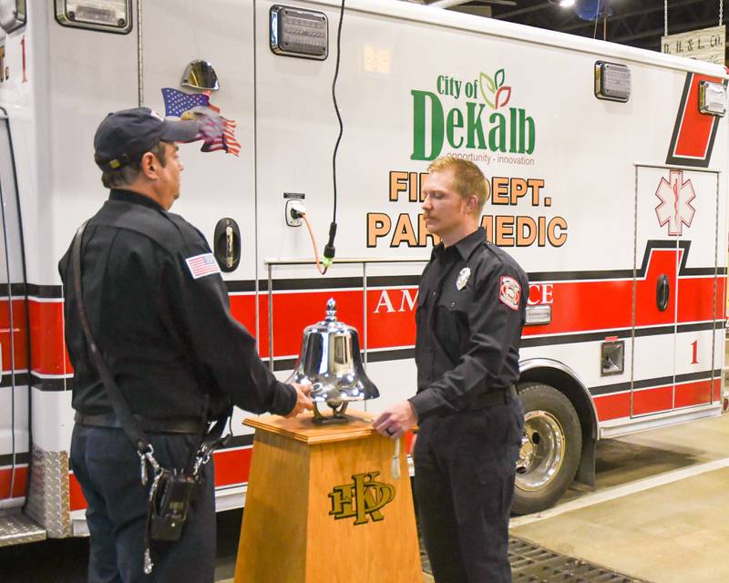 DeKalb’s fire department Patrick Erikson, left, and Vincent Laudicina ring the bell during the 9-11 remembrance ceremony held at DeKalb's Station one on Sunday Sept 11th.