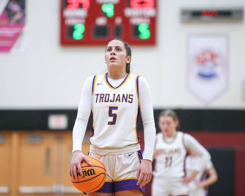 Downers Grove North's Campbell Thulin (5) prepares to shoot a free throw during their Regional Final basketball game between Downers Grove North at Plainfield North. Feb 20, 2025 in Plainfield.