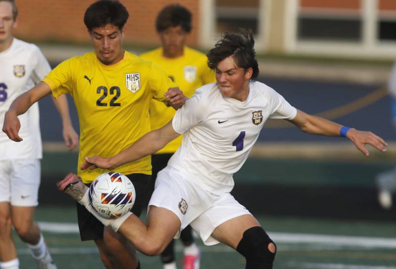 Wauconda's Daniel Karecki kicks the ball away from Harvard's William Salgado from getting to the ball during the IHSA Boys Soccer 2A Grayslake Central Sectional semifinal match on Tuesday, Oct. 29, 2024, at Grayslake Central High School,
