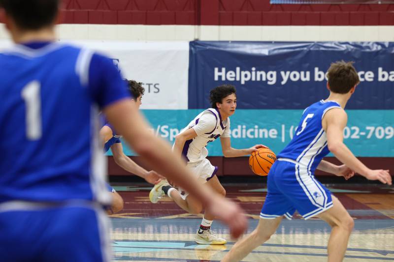 Manteno's Quinnten Campbell brings the ball up during the Panthers' 60-49 victory over Peotone in the 75th Kankakee Holiday Tournament opening round on Friday, Dec. 26, 2025.