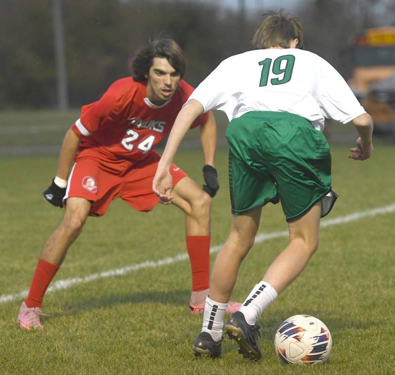 Oregon's Chase Buchanan (24) defends North Boone's Gabriel Bueno (19) on Tuesday, Oct. 21, 2025 at the 1A Byron Regional.
