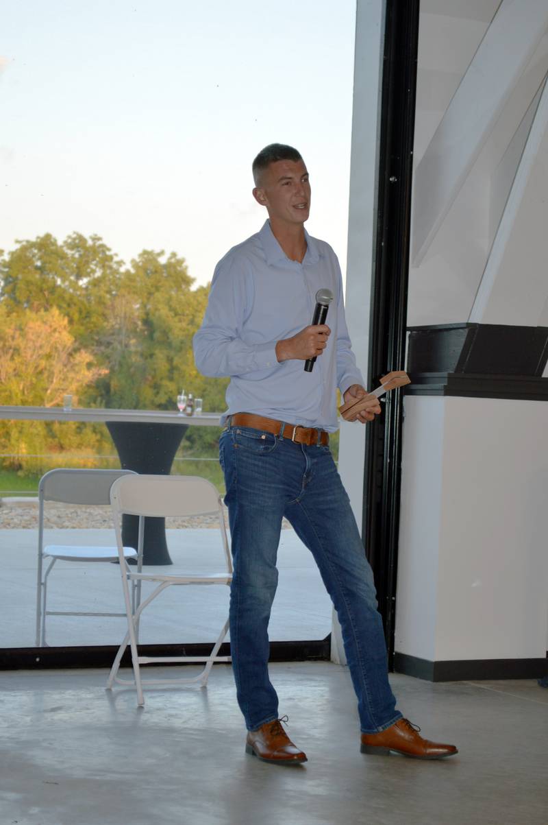 Tyler Hagemann, of Hagemann Horticulture, speaks after accepting the Oregon Area Chamber of Commerce's Business of the Year award. The Chamber's annual awards dinner took place Thursday, Aug. 17, 2023, at River's Edge Experience in Oregon.