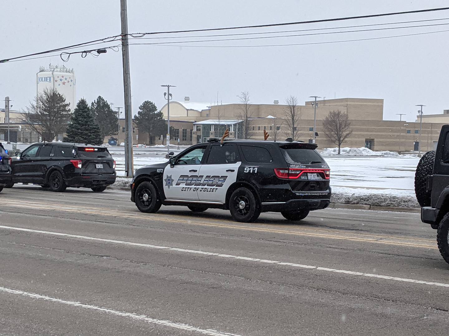 A parade to give Santa a send off before he heads back to the North Pole travels past Plainfield South High School on Saturday, Dec. 13, 2025.