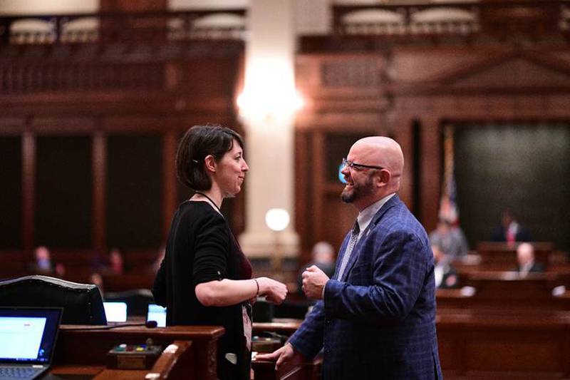 State Rep. Jeff Keicher (right) and State Rep. Lindsey LaPointe (left) celebrate the passage of their legislation to protect restaurants from bad-faith delivery services.