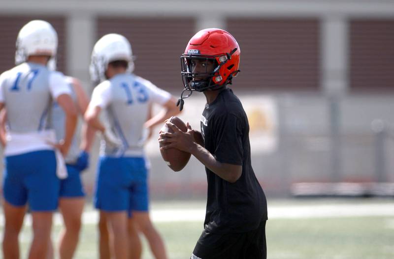 Bolingbrook’s Tyson Ward looks to throw the ball during a 7 on 7 tournament on Thursday, July 10, 2025 at Batavia High School.