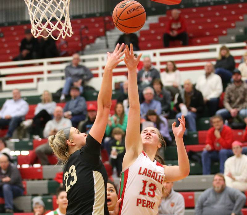 L-P's Olivia Shetterly shoots a jump shot over Sycamore's Evyn Carrier on Tuesday, Jan. 31, 2023 at L-P High School.
