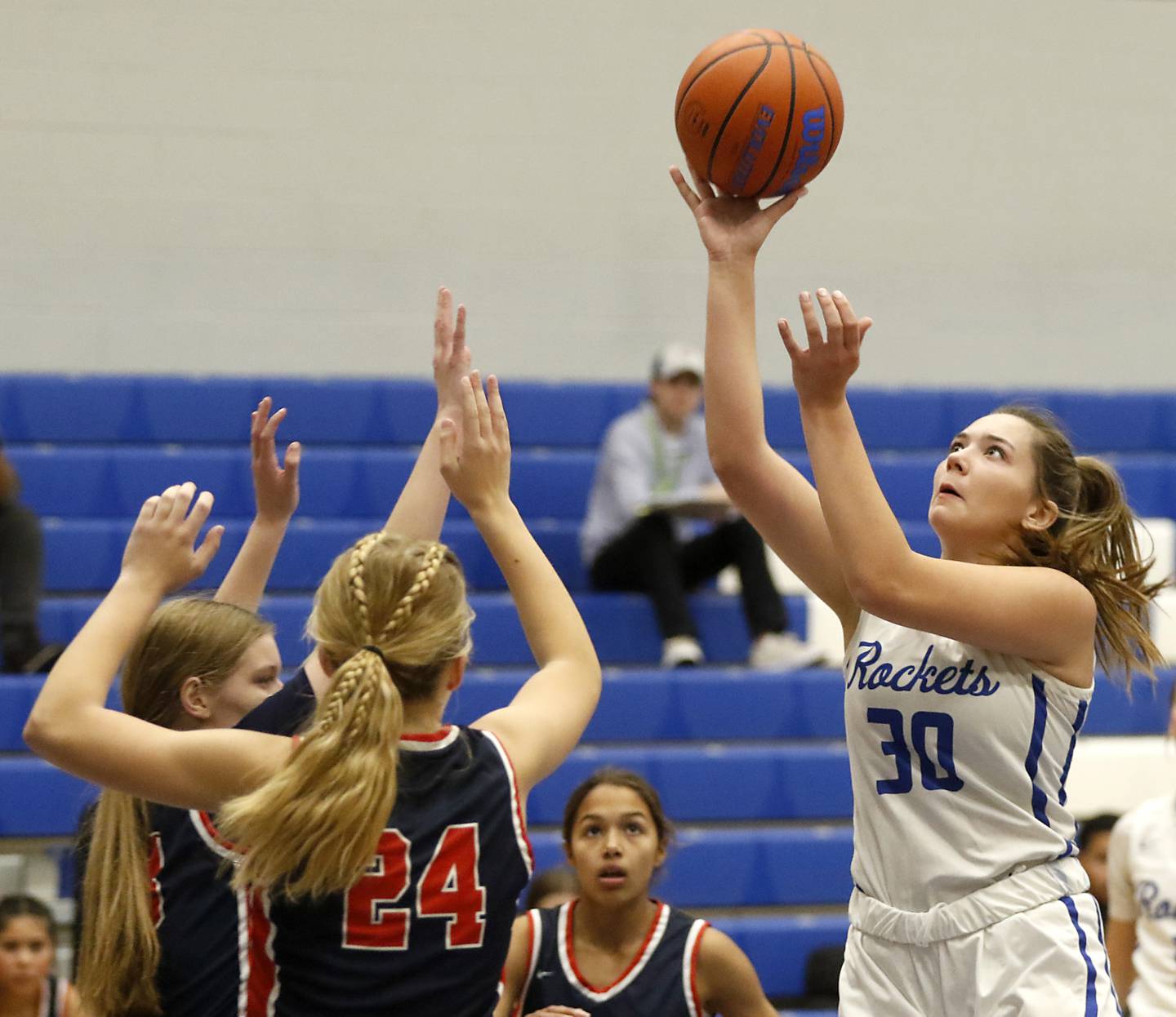 Burlington Central's Emma Payton shoots the ball over Belvidere North's Brooke Bottcher on Monday, Nov. 13, 2023, during pool play girls basketball game in the Burlington Central Mark Einwich Tournament.