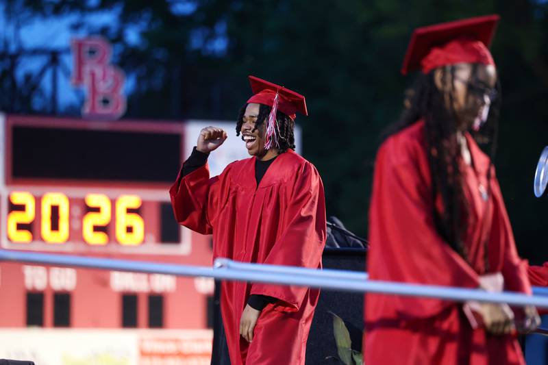 Jaylen Robertson pumps his fist as he crosses the stage during the Bradley-Bourbonnais Community High School commencement ceremony on Thursday, May 21, 2026.