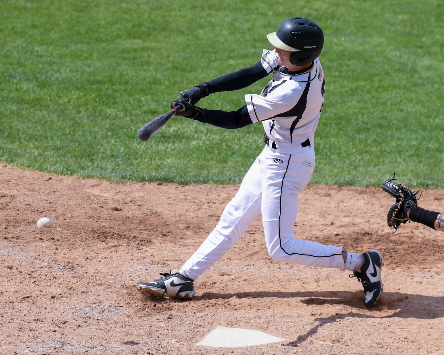 Sycamore's Ben Anderson (3) gets a base hit during the game on Saturday May 3, 2025, while taking on DeKalb High School held at Sycamore Park District Sports Complex.