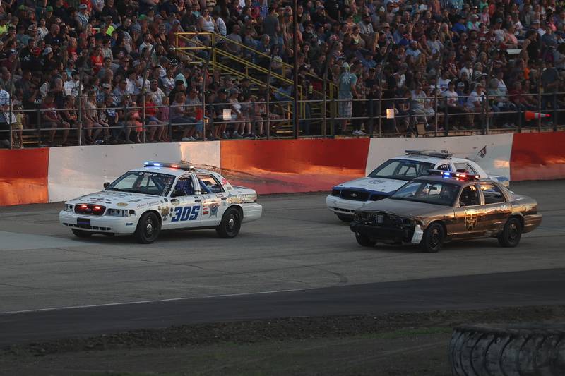 Police officers from Will and Grundy Counties race in the Five-O Race that raised over $180,000 for Special Olympics at Grundy County Speedway on June 15, 2024 in Morris.