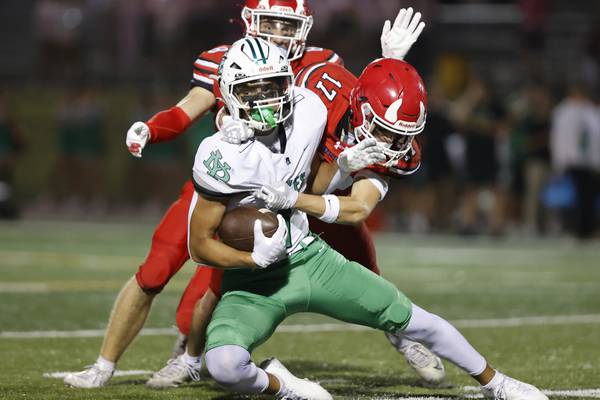 Photos: York, Hinsdale Central football meet in West Suburban Conference action